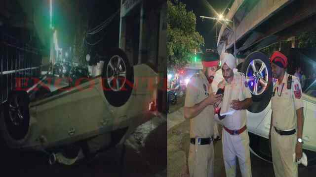 Jalandhar News: मेन चौक पर पलटी Overspeed Audi, चालक फरार, शराब की बोतल बरामद, देखें वीडियो