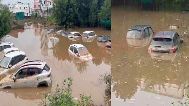 मूसलाधार बारिश का कहर जारी, पानी में डूबी सोसाइटी के बाहर खड़ी कारें, देखें वीडियो