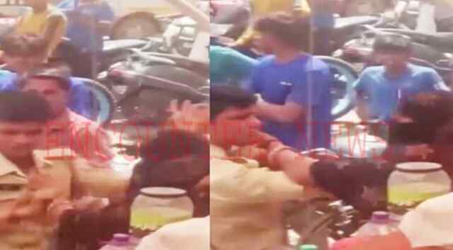 बीच सड़क पर महिला ने पुलिसकर्मी पर की थप्पड़ों की बरसात, वीडियो वायरल