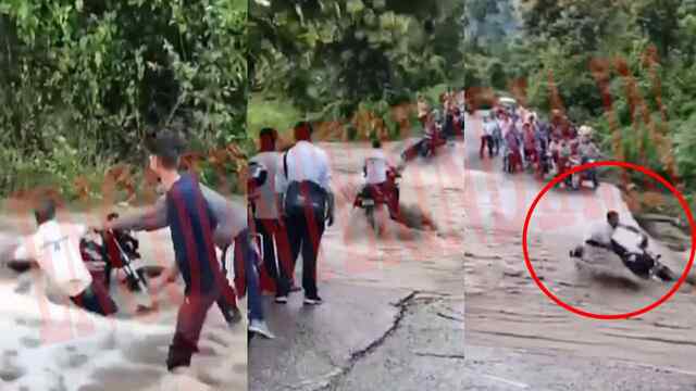 पानी के तेज बहाव में बह गया बाइक सवार, देखें वीडियो