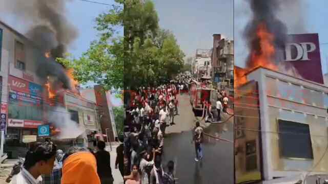 DP Jewellers की छत पर लगी आग, मची अफरा-तफरी, देखें वीडियो