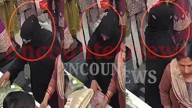 Punjabi Market में दुकान से सूट चुराकर महिला फरार, देखें CCTV