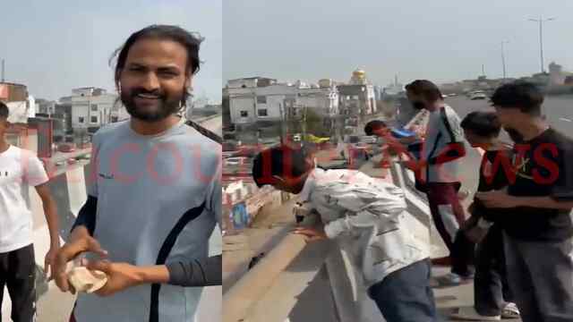एलिवेटेड ओवर ब्रिज पर युवक ने की नोटों की बारिश, उमड़े राहगीर, बेबस दिखी पुलिस, देखें वीडियो