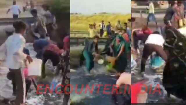 Highway पर पलटा डीजल से भरा टैंकर, लोगों में मची लूटने की होड़, देखें वीडियो